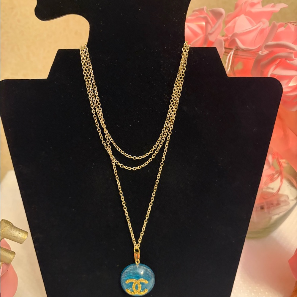 Gold Necklace with Blue Pendant